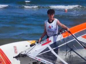 Calum walking out to start competing in the European Windsurfing Championships